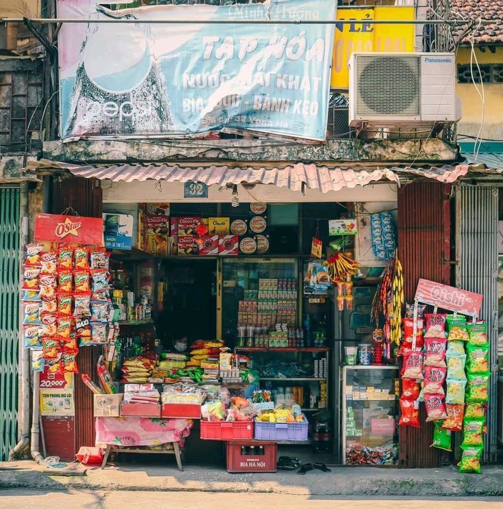 An overflowing patchwork storefront packed with snacks and signs, reflecting the inherent maximalism found in everyday Filipino pop culture.