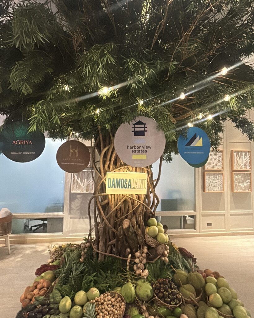 Tree of Dreams centerpiece surrounded by fresh Mindanao harvest at Damosa Land Kadayawan Open House.