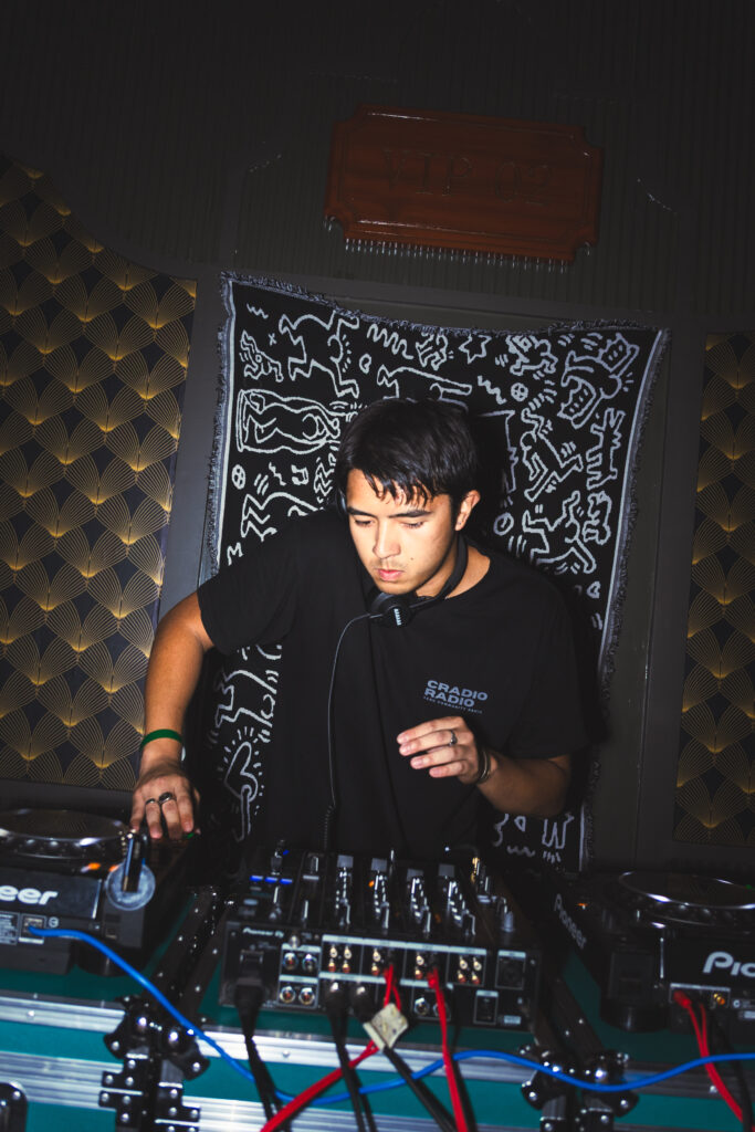 Moni-Moni of Cradio Radio DJing at an underground dance party in Davao City
