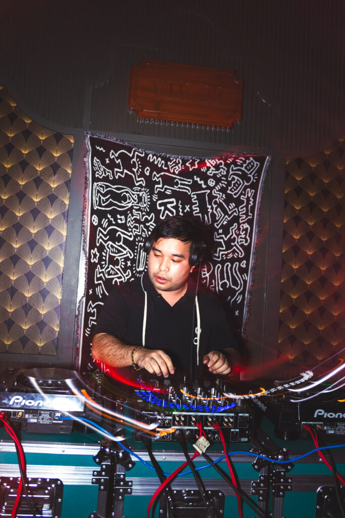DJ Trust playing an underground techno set at the Mixed Temptations party