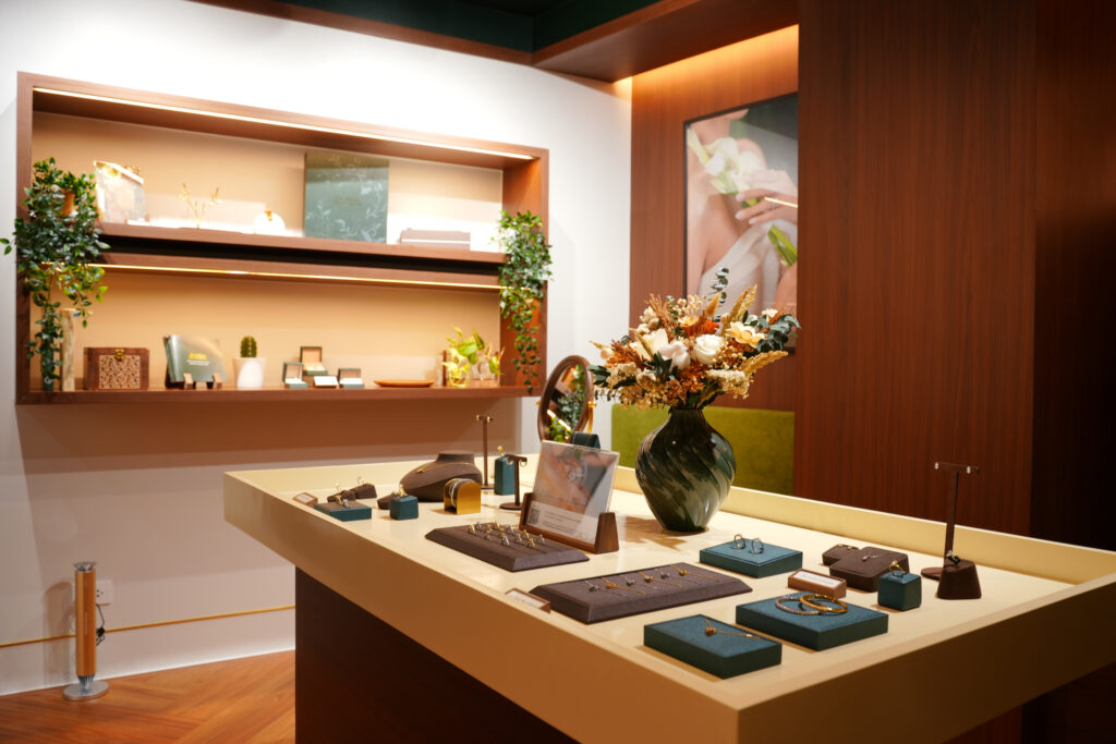 Center display counter at Pristine Paradigm Makati showroom featuring curated fine jewelry